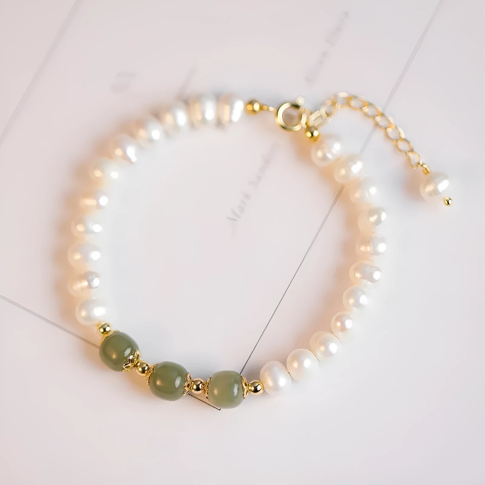 Korean style freshwater pearl bracelet with diamond-shaped electroplated beads in jade colours