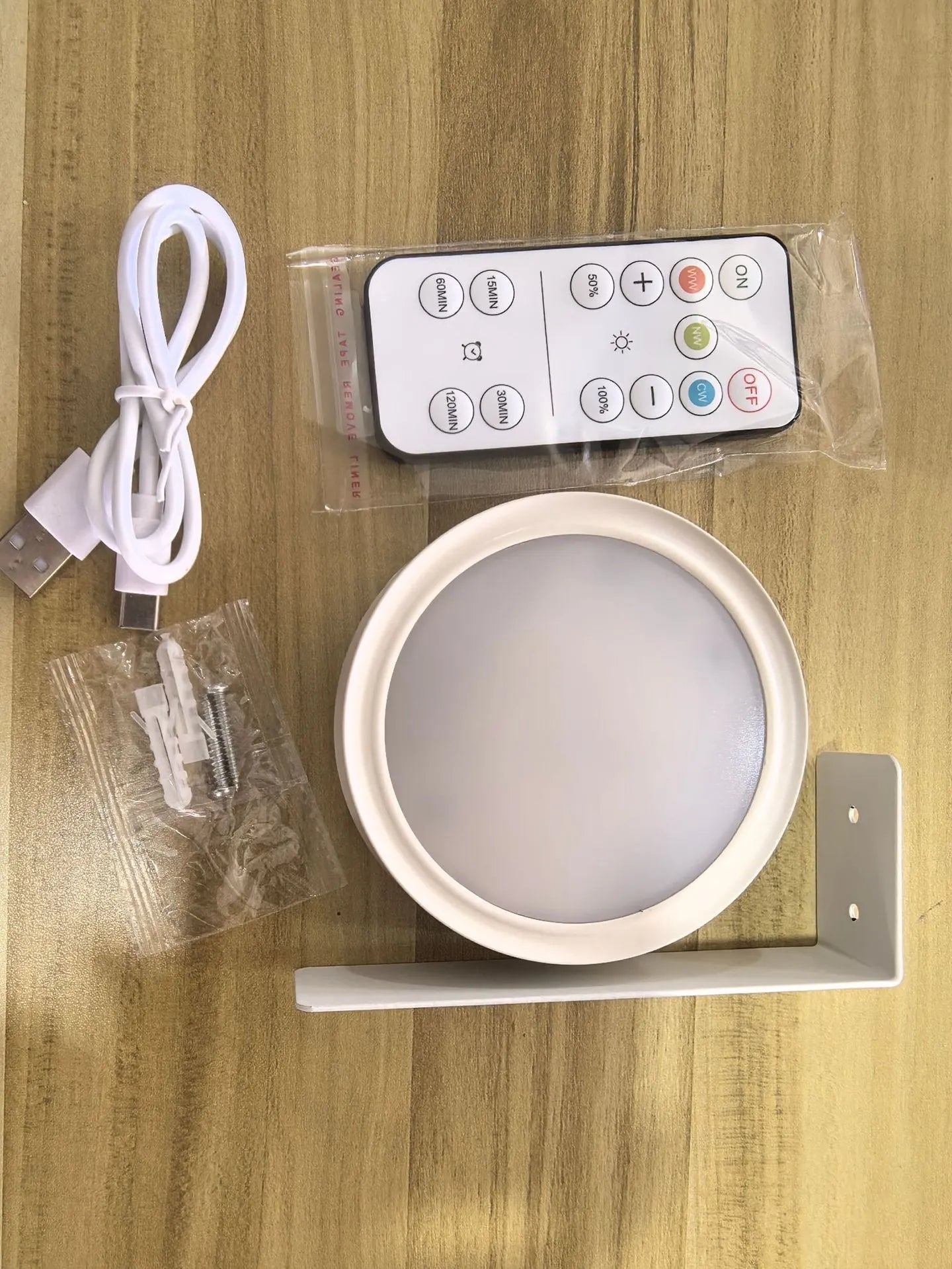 Wireless LED painting lamp with magnetic charging and remote control in black, white or gold finish