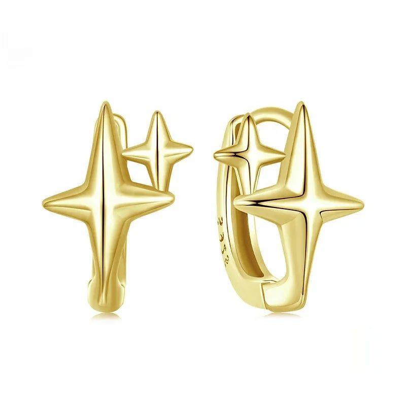 Sterling silver star clip earrings with oxidised finish and XINGX design details