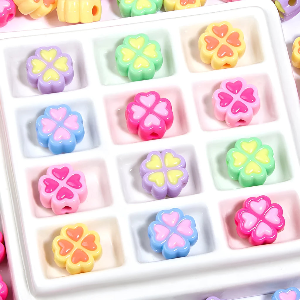 15mm frosted acrylic four-leaf clover love beads in mixed colours including rose red, pink, yellow, green, blue, purple.