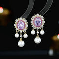 Oval geometric copper earrings with zircon inlays and pearl tassels in light purple colour option