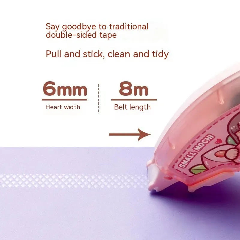 Dotting glue applicator in peach juice colour on a card, a high viscosity traceless adhesive for crafts.