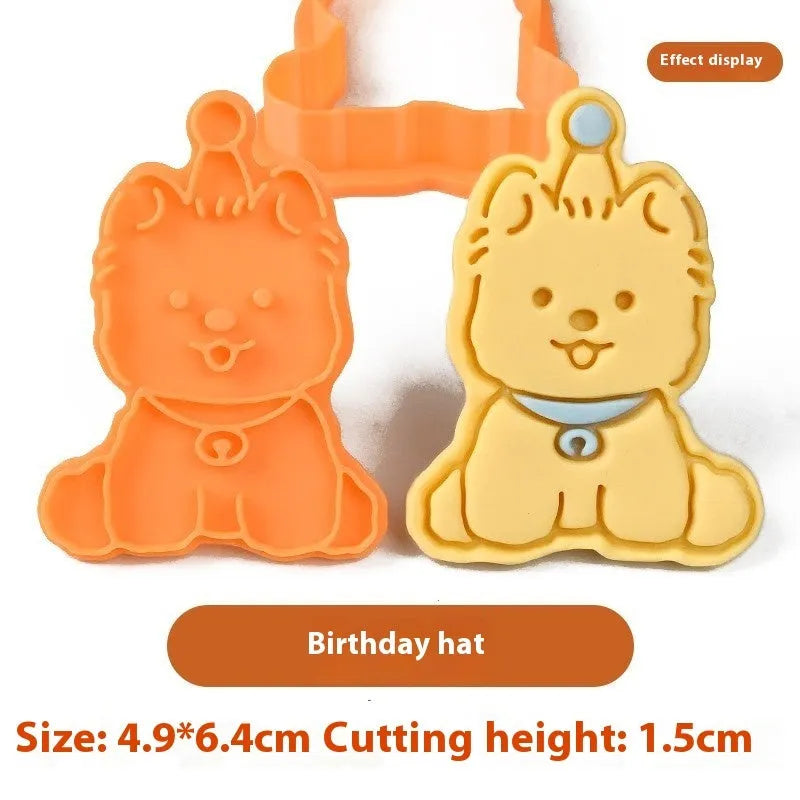 3D plastic biscuit mould with cartoon dog shapes including puppy head and birthday hat