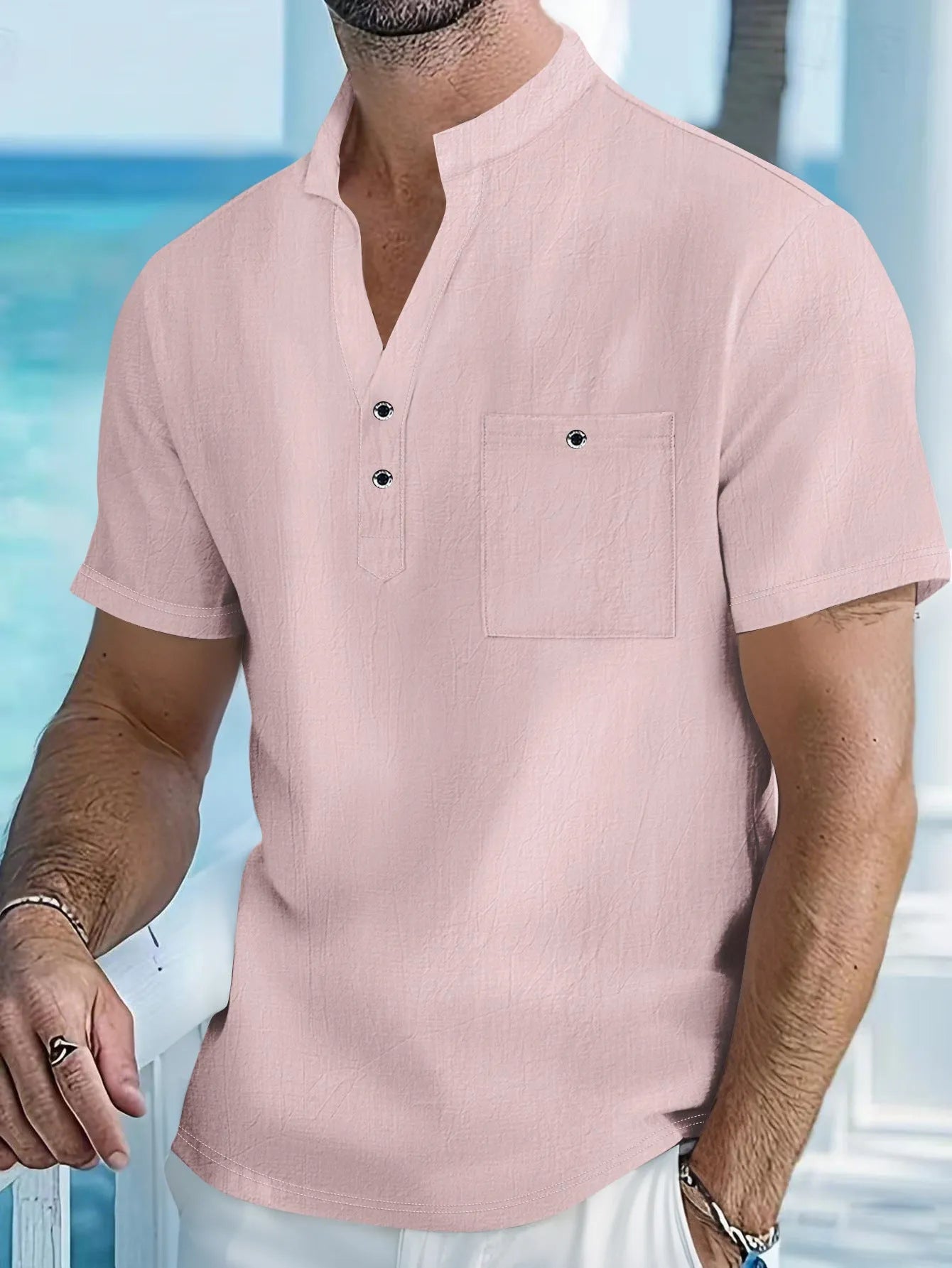 Men's loose fit linen blend short sleeve T-shirt with a stand collar in a light colour.