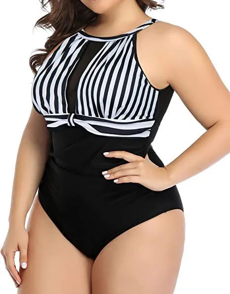 Women's solid colour polyester one-piece swimsuit with lace detailing in black colour