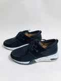 Women's casual suede sneakers with a wedge heel in various colours including black, pink, and leopard print.