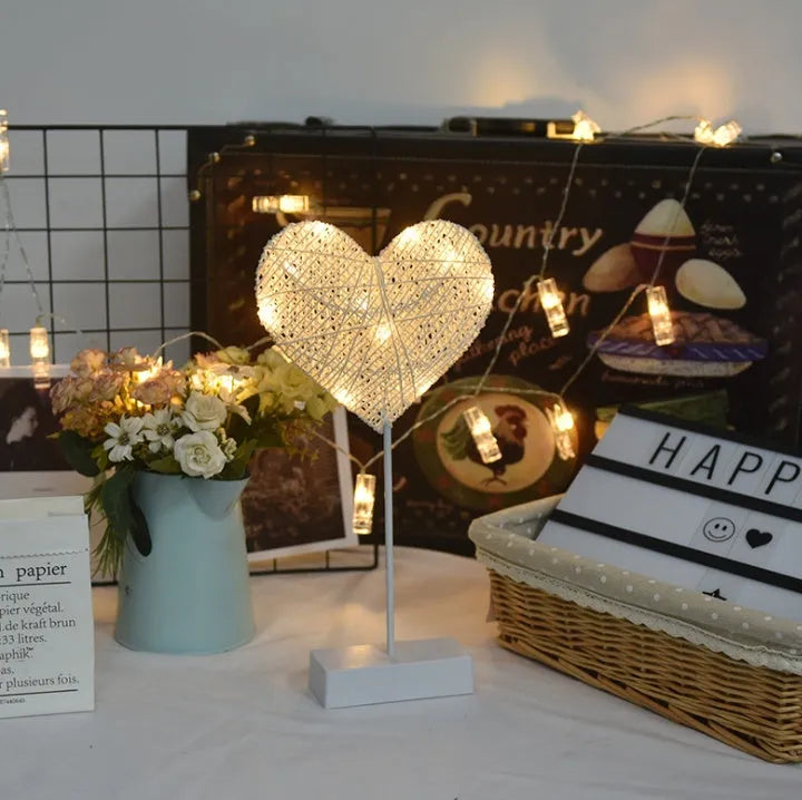 LED string lights with star, heart and moon shapes made from rattan and copper wire for bedroom decoration