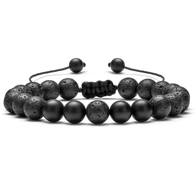 Geometric couple bracelet made of matte black agate beads with a tiger eye stone.