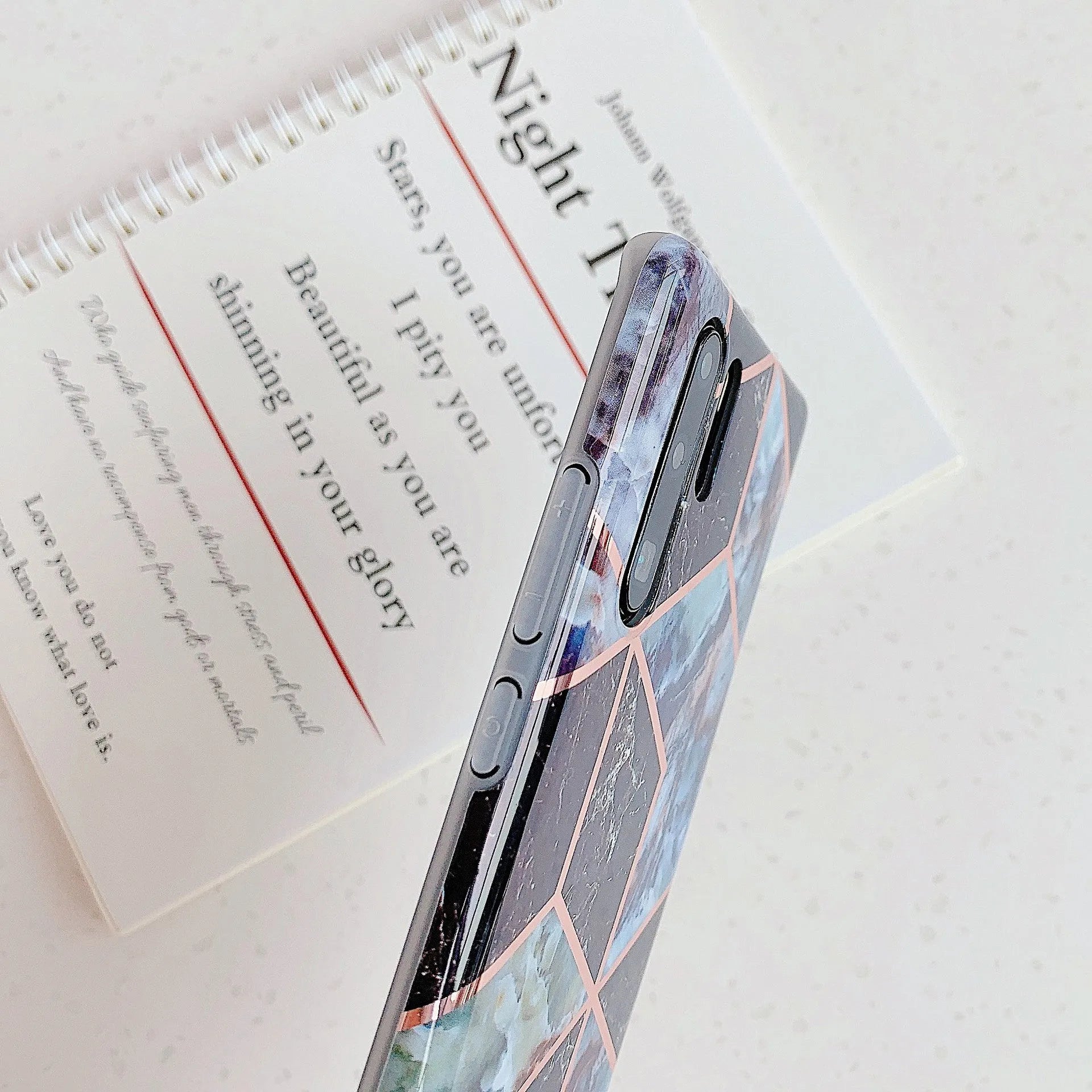 Electroplated marble pattern mobile phone case for Huawei and Samsung smartphones in various colours.