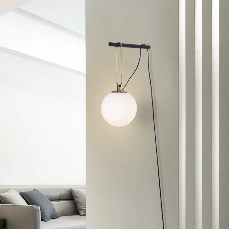 Nordic style modern glass wall lamp showing three selectable light colour temperatures.