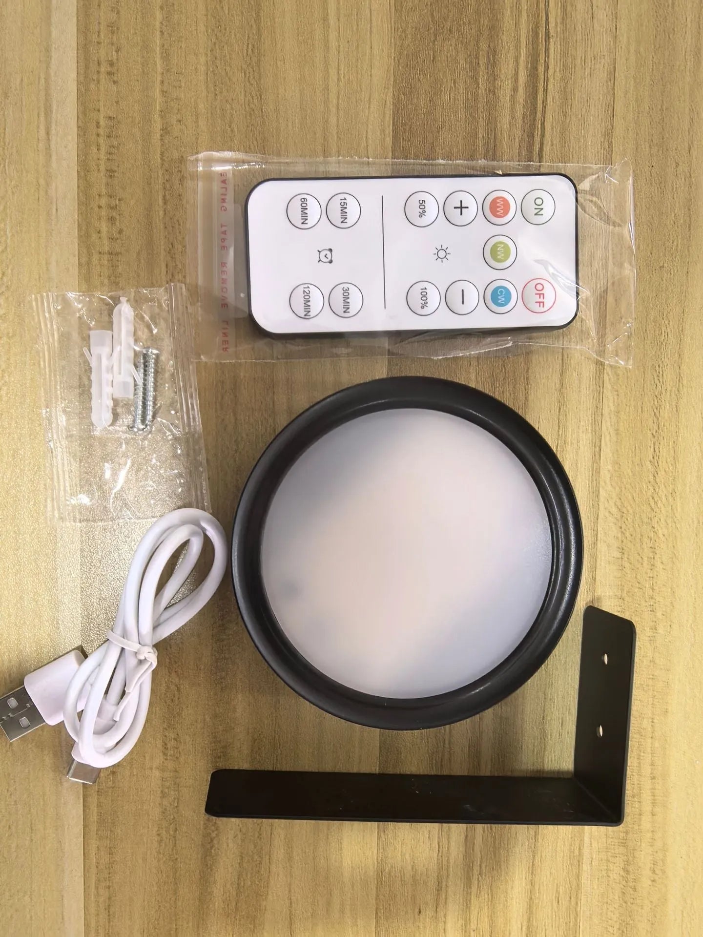 Wireless LED painting lamp with magnetic charging and remote control in black, white or gold finish