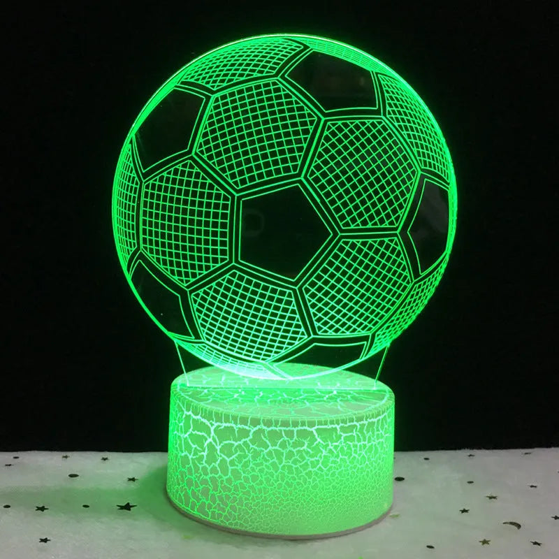 3D acrylic football night light showing red LED colour, with USB cable and remote control.