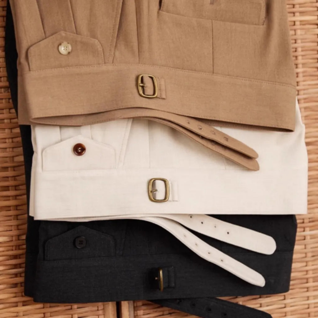 Men's slim fit straight leg trousers in dark grey, light brown, and light apricot