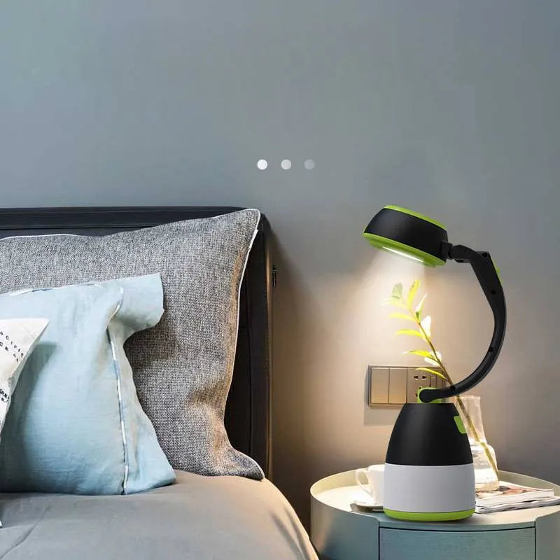 Black green foldable 3-in-1 LED lamp showing adjustable head and compact size for camping and desk use