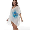 White plus size loose fit beach cover-up blouse for women, shown as swimwear cover.