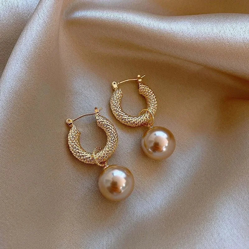 Women's zircon earrings with electroplated finish in geometric rose designs on copper
