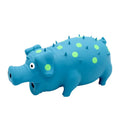 Blue latex pig-shaped dog chew toy with textured surface and squeaker inside.