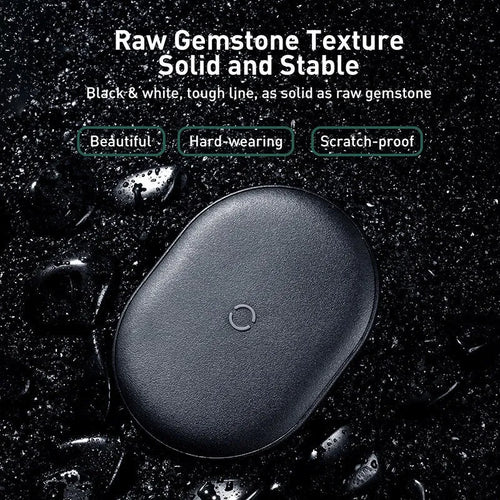 Baseus Rough 15W wireless charging pad in black colour on a desk surface