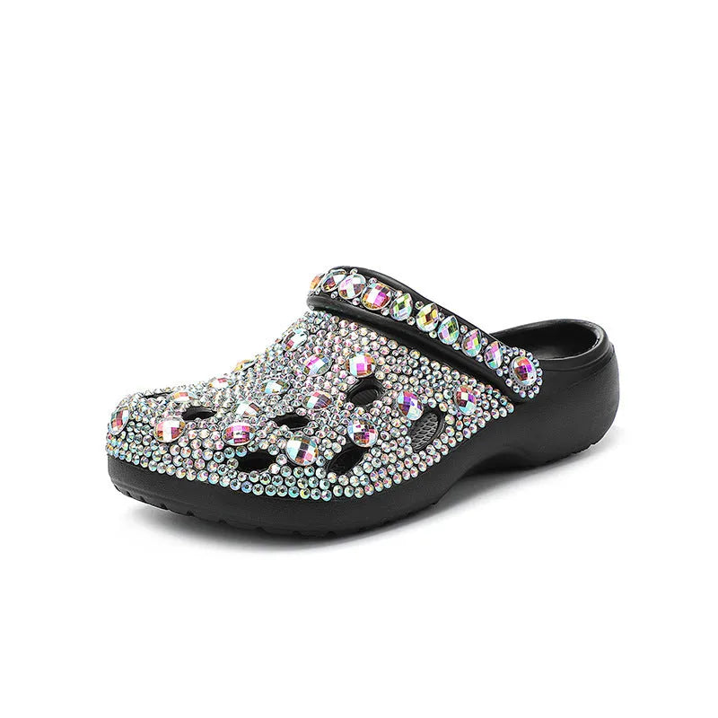 Black women's platform sandals with rhinestone details and a hole-patterned EVA upper.