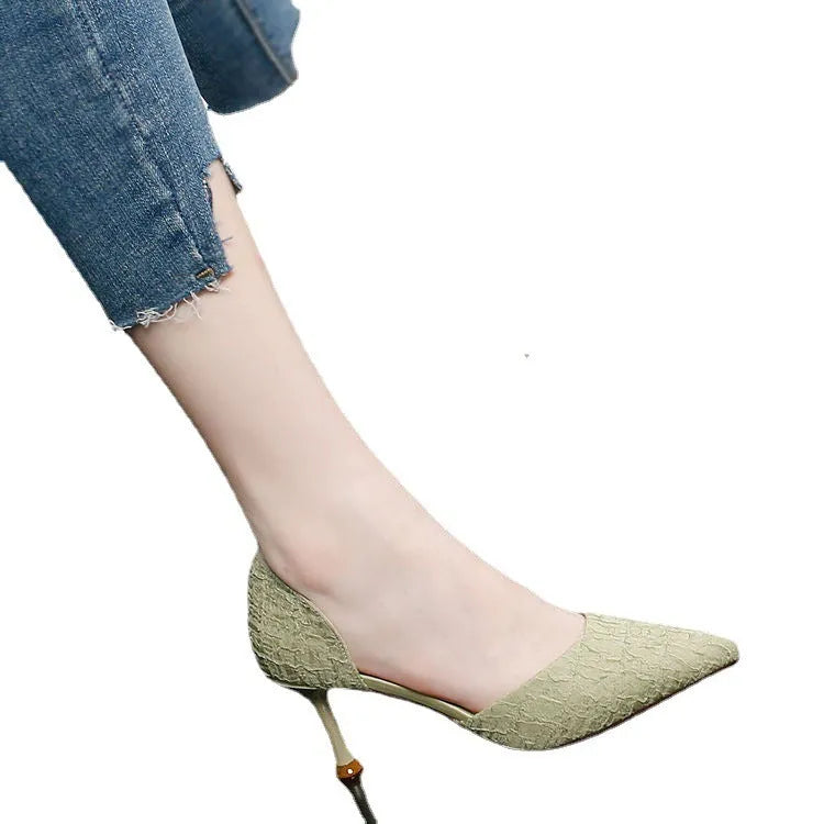 Women's pointed toe stiletto heels with sheepskin and cowhide stitching detail on the upper and rubber sole.