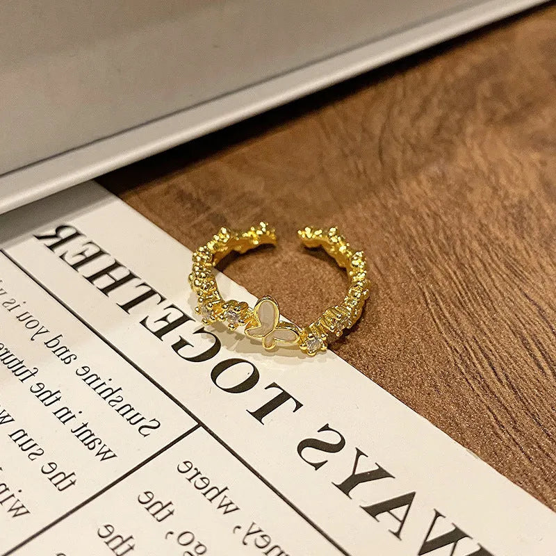 Copper women's ring featuring a creative Chinese butterfly design, available in multiple colours.