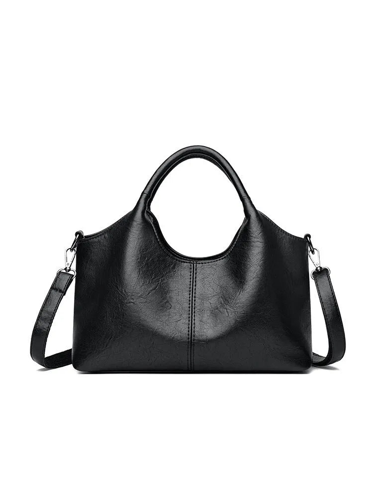 Genuine leather women's cross-body bag in a choice of seven colours including black, brown, and wine red
