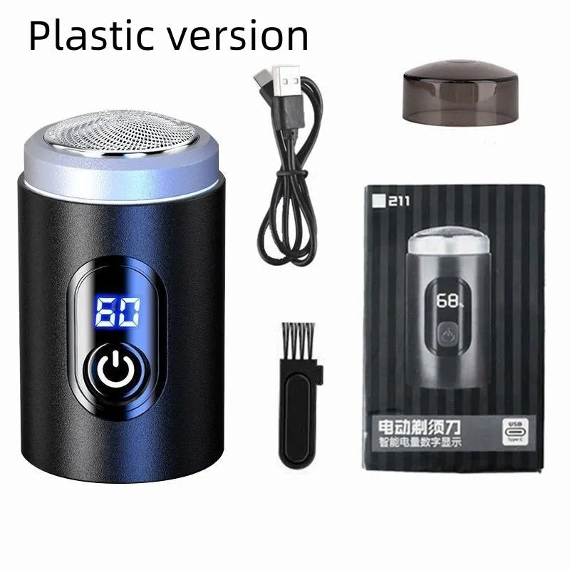 Black mini portable USB rechargeable electric shaver with cleaning brush and cable.