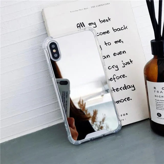 Mirror finish protective TPU case for iPhone shown in various colours.