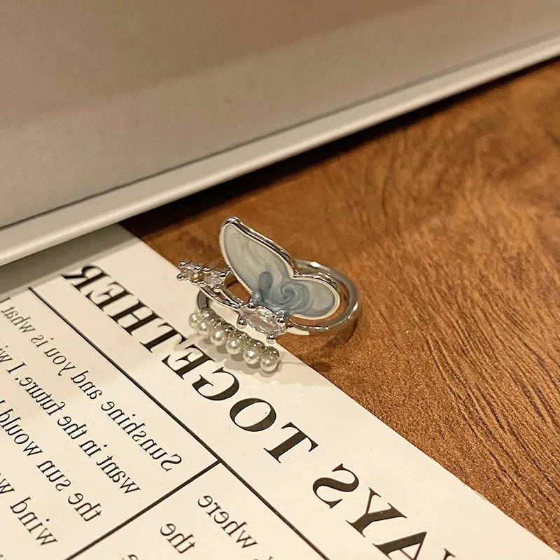 Copper women's ring featuring a creative Chinese butterfly design, available in multiple colours.