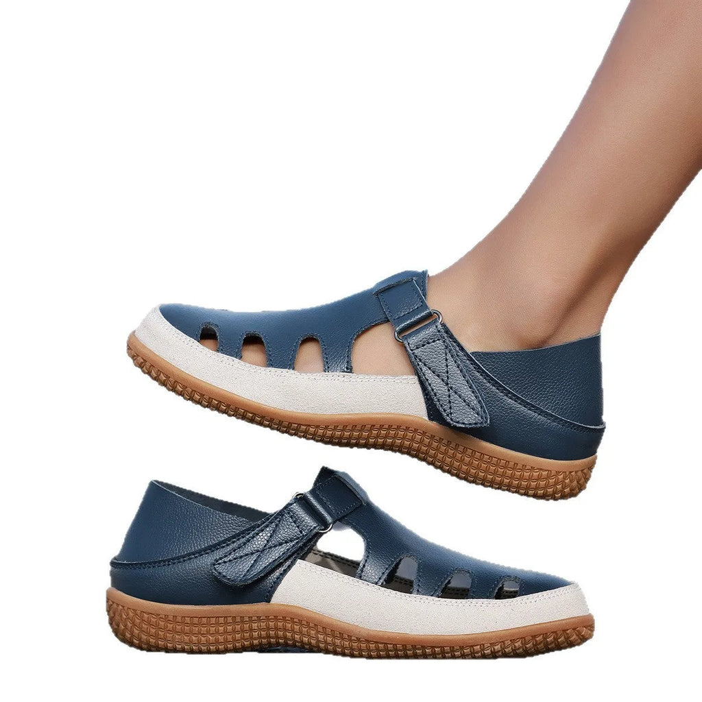 Plus size women's flat sandals in blue with hollow toe cap and thick rubber sole