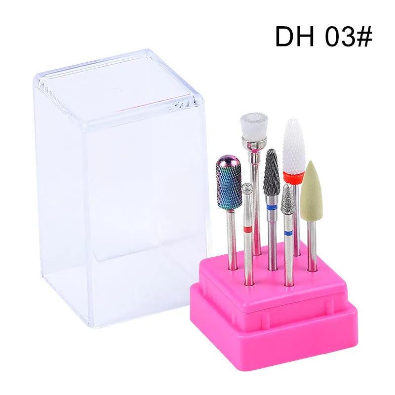 Set of seven tungsten steel nail drill bits and a brush in a transparent storage case.