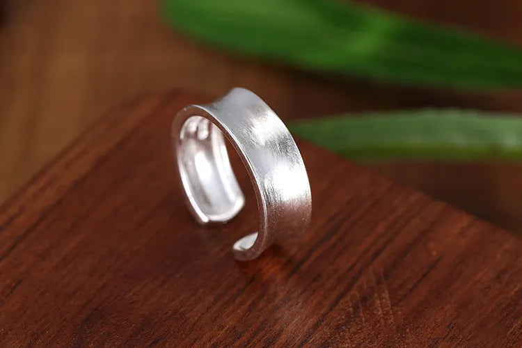 Sterling silver geometric open ring with frosted finish and adjustable opening