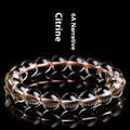 Natural citrine scattered bead and ball bracelet shown in selectable 7A or 6A grade colour.