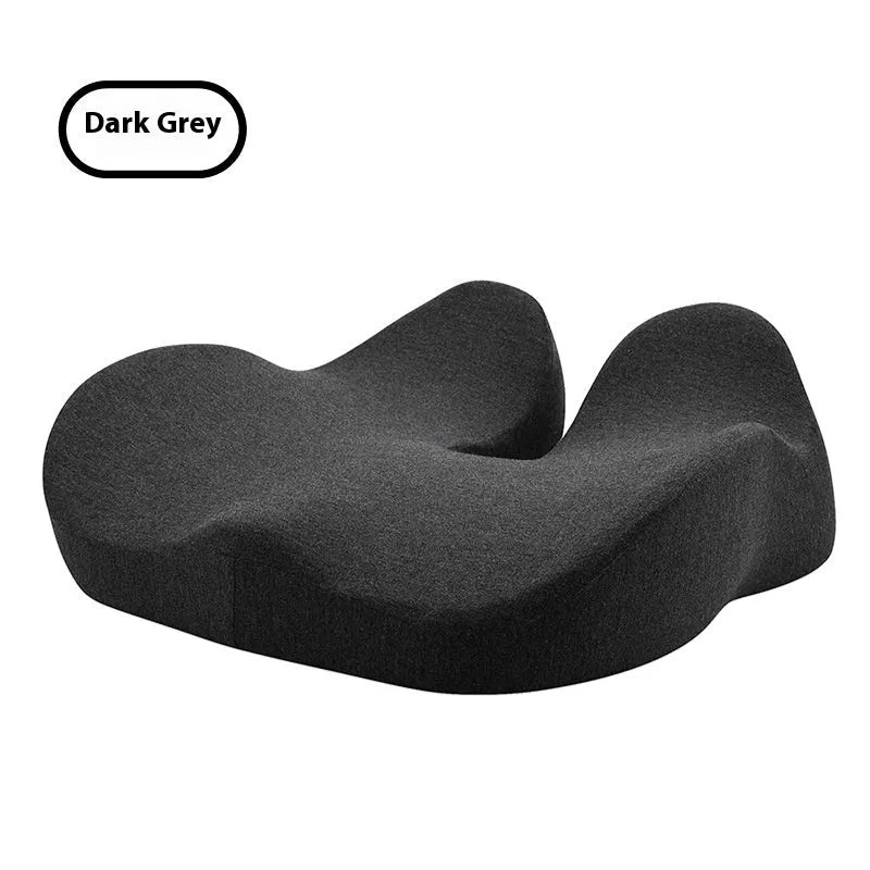 Memory foam office chair seat cushion in light grey, shown on a black office chair.