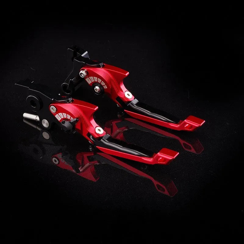 Pair of anodised metal motorcycle brake and clutch levers with adjustable length mechanism