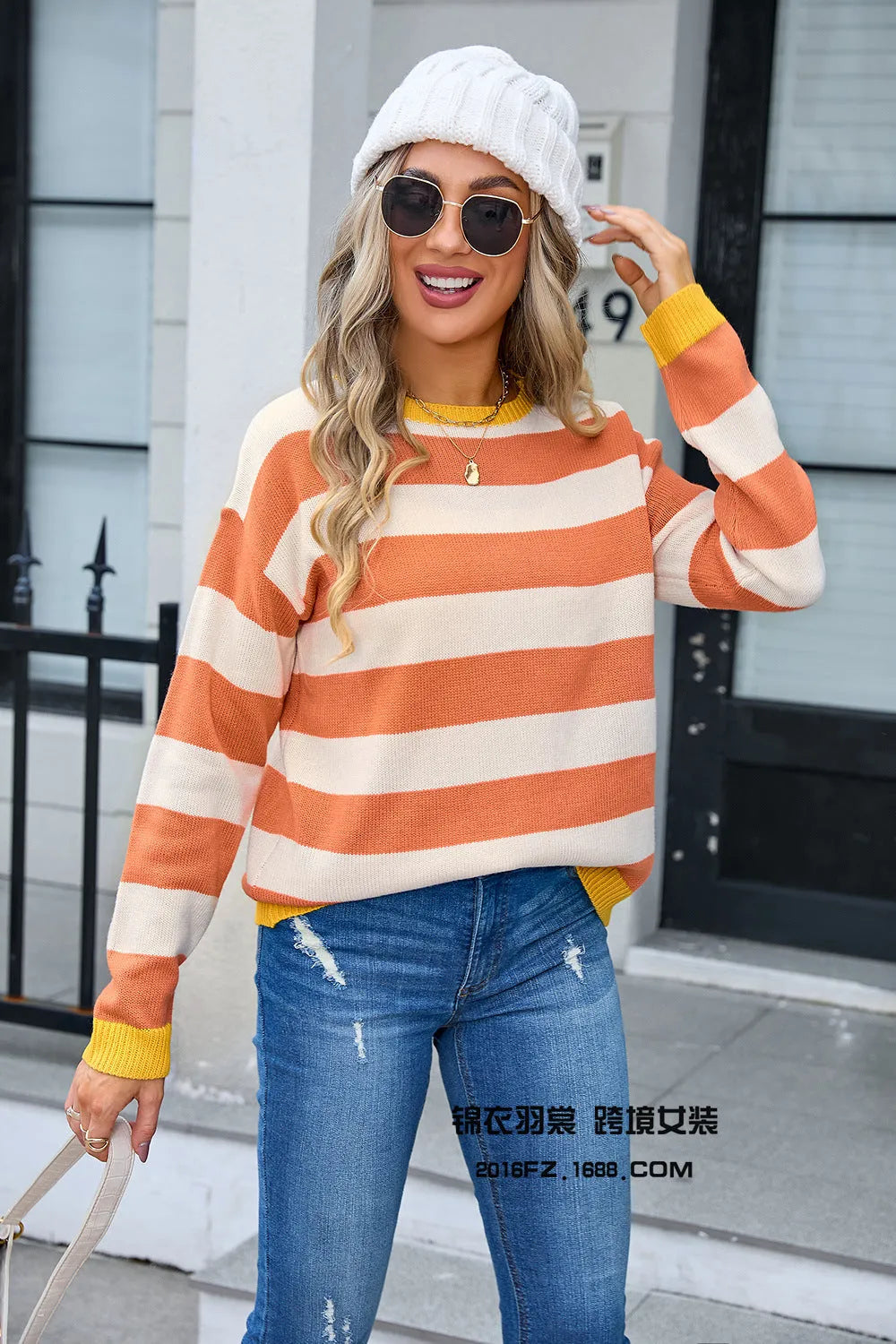 Women's loose fit acrylic flower pattern long sleeve sweater in blue colour with round neckline