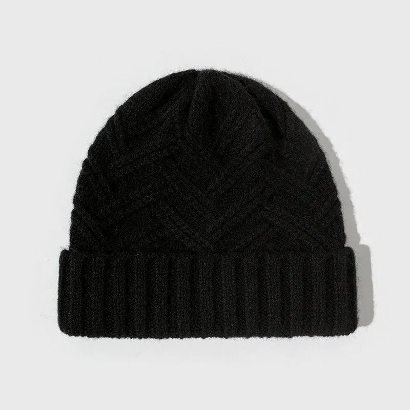 Women's wool knitted dome winter hat with a textured totem pattern.