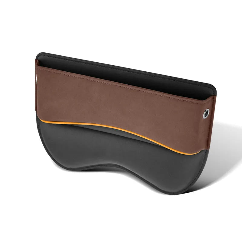 Leather car seat storage box in beige suede colour on a vehicle seat