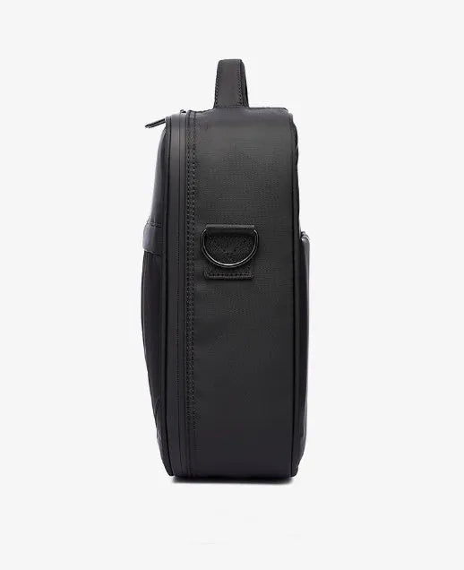 Black Oxford fabric men's messenger bag showing shoulder strap and structured shape