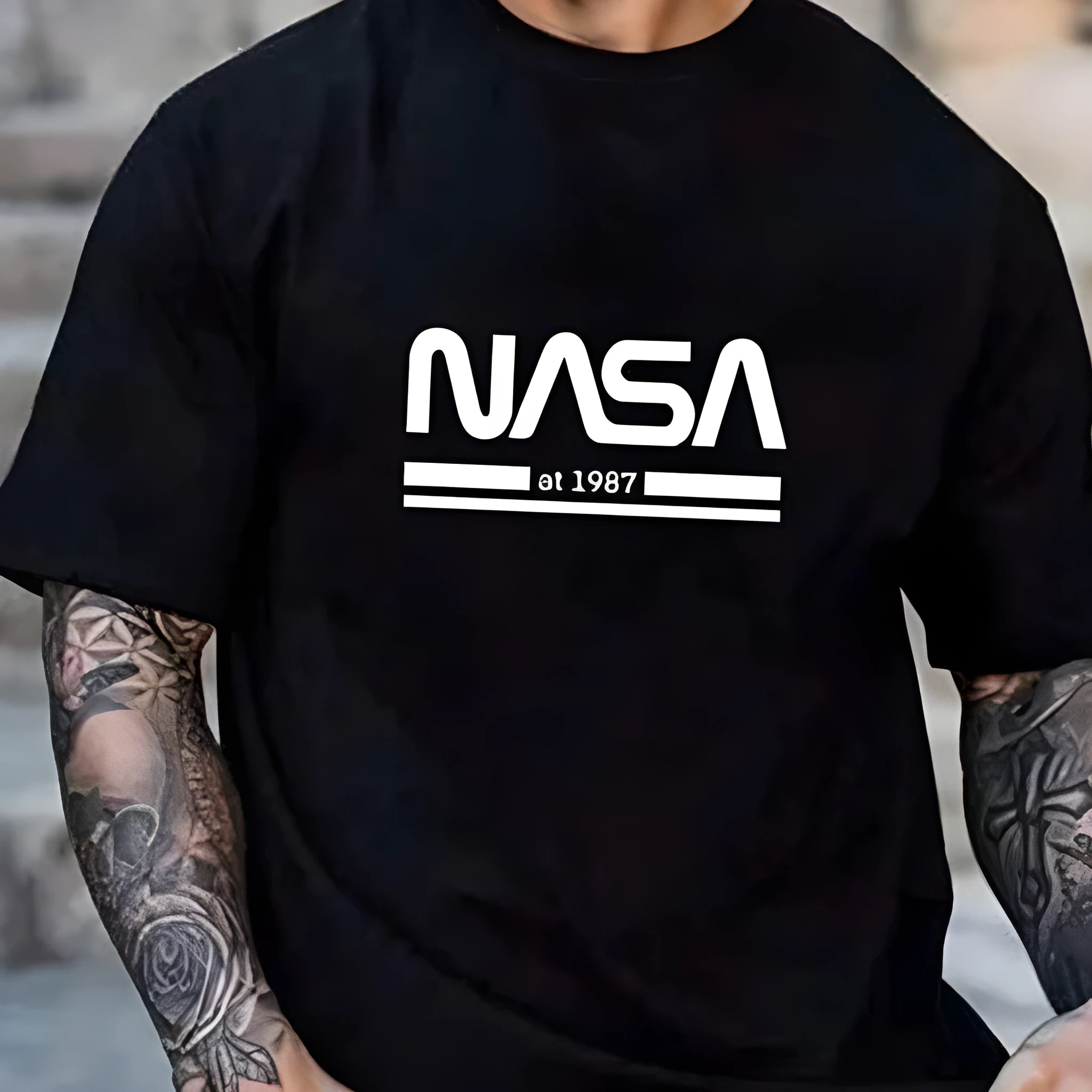 Men's slim-fit short sleeve cotton t-shirt in a straight cut, shown in a selection of available colours.