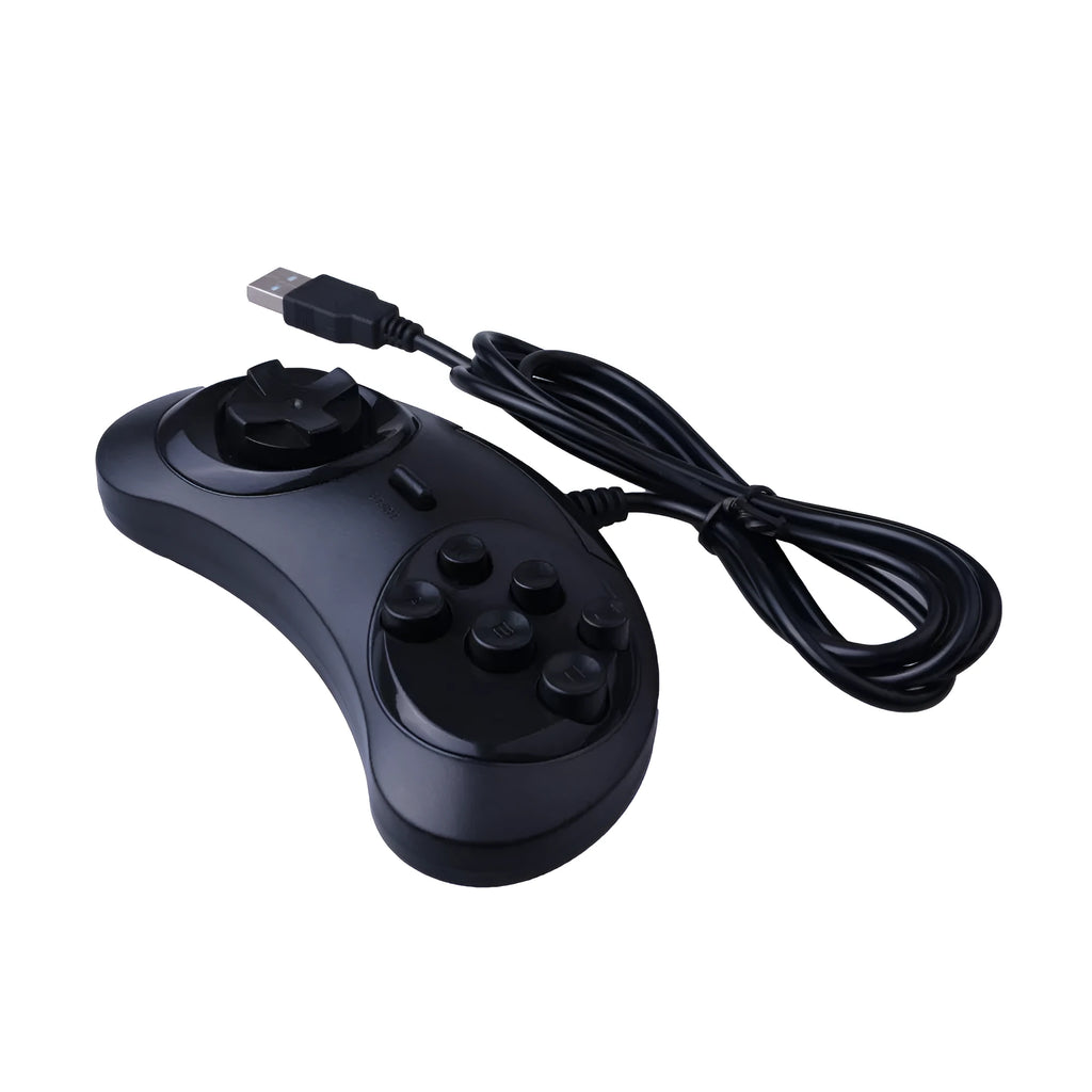 Black Sega USB computer game controller with 1.8m cable on a desk.