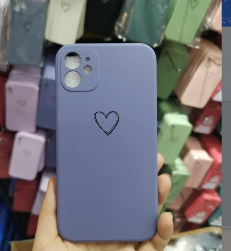 Silicone TPU back cover case for iPhone in solid colours like black, pink, and green on a white background.