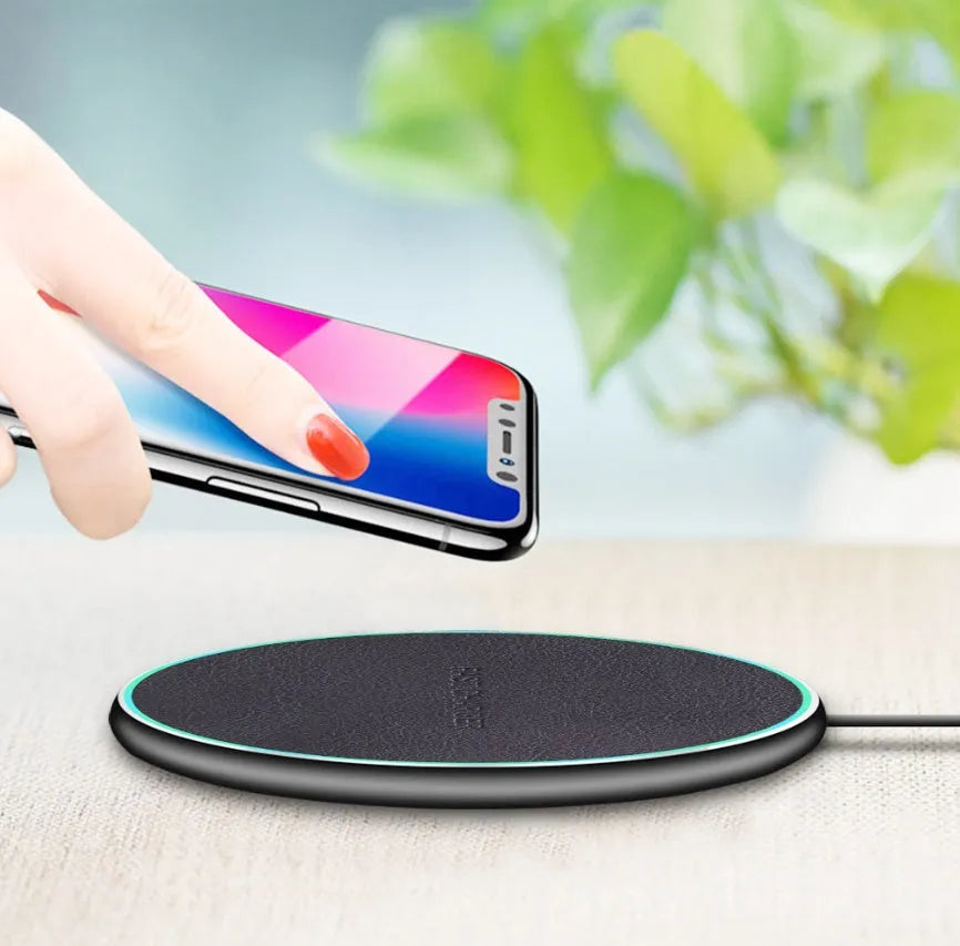 Black Quick Qi wireless charging pad for iPhone 11 with USB-C cable