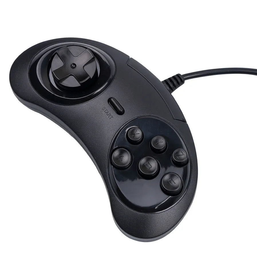 Black Sega USB computer game controller with 1.8m cable on a desk.