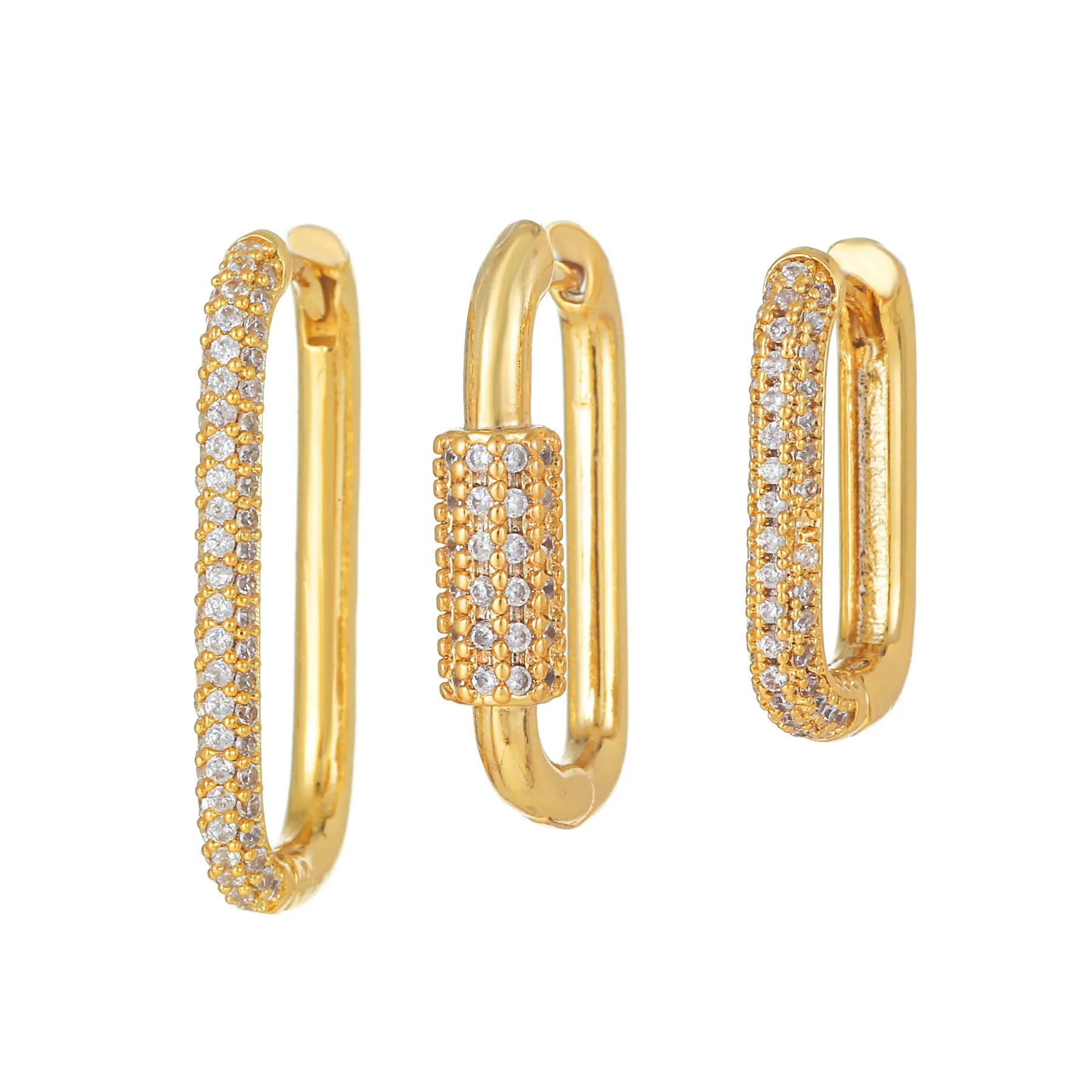 Three geometric square ear clips with inlaid zircon details in gold and white finishes on a grey background.