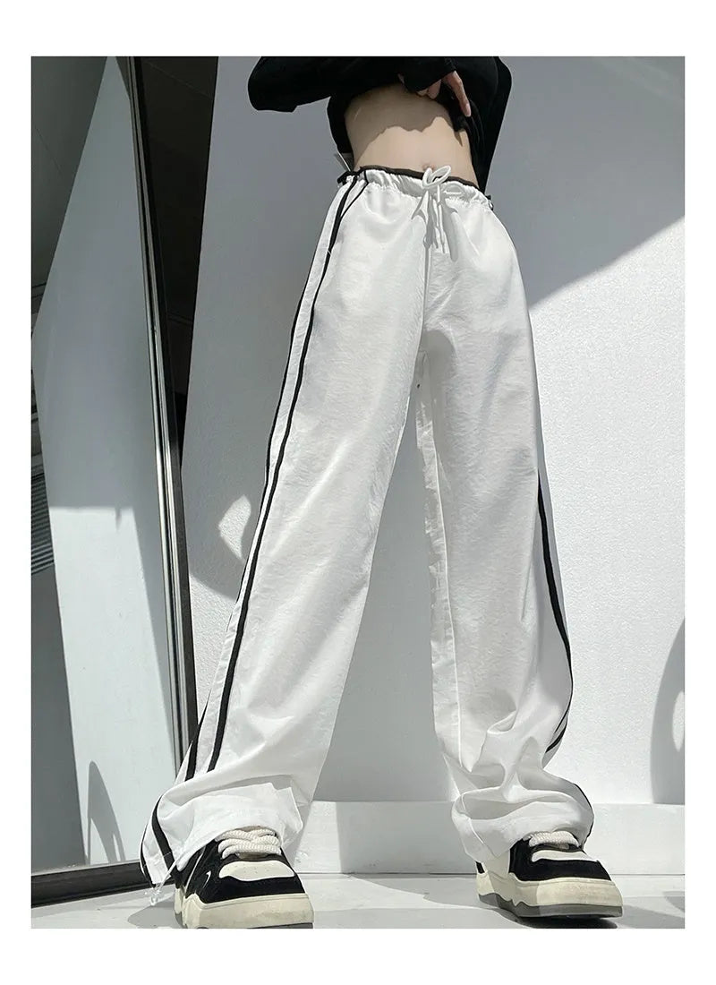 Women's slim-fit drape trousers in thin fabric with low waist and straight leg