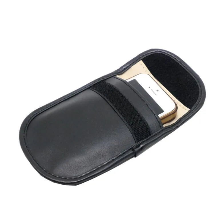 Black microfiber Faraday cage bag for blocking car key fob and RFID signals.