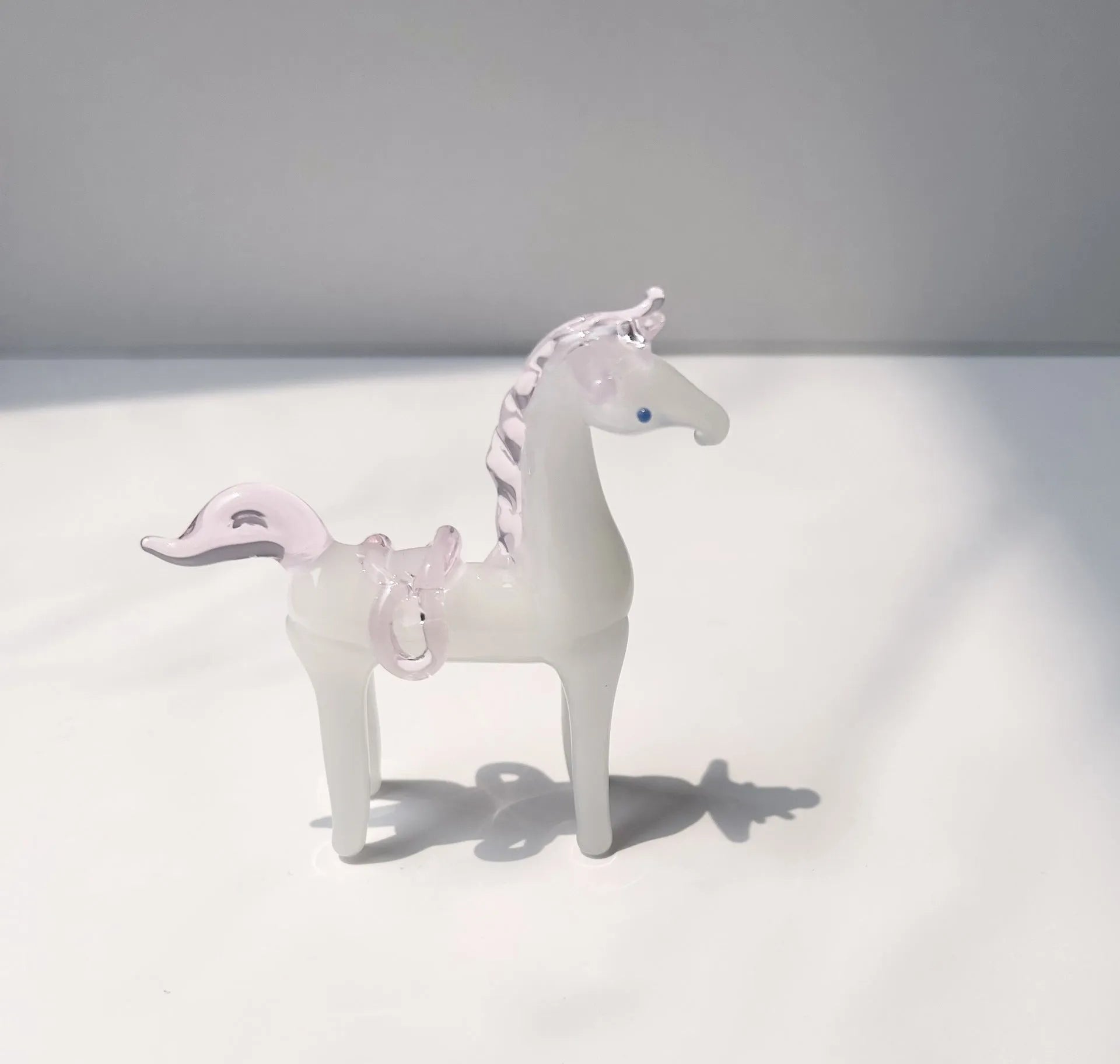 Glazed horse office decoration in coloured glaze, available in brown or white.