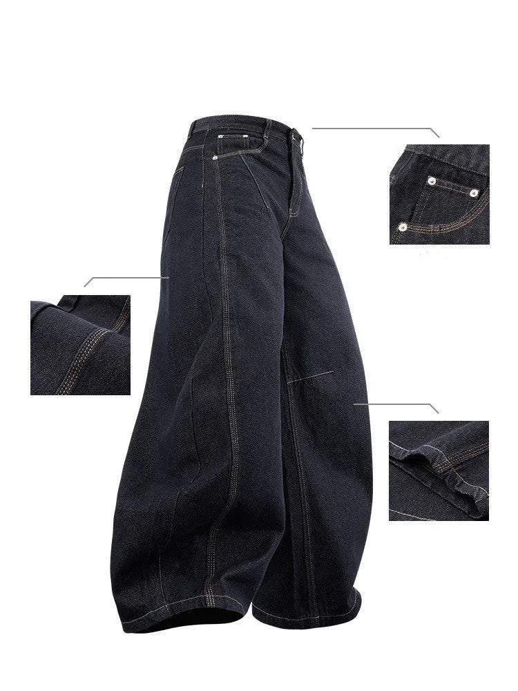 Men's original cow colour wide leg denim trousers with a mid-waist, laid flat.