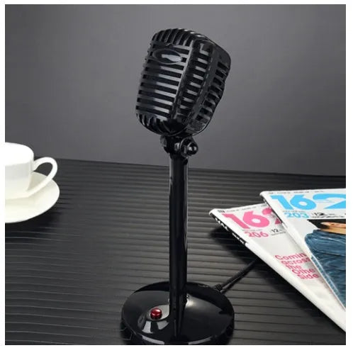 Black USB desktop microphone on a weighted stand with a pop filter and long cable.